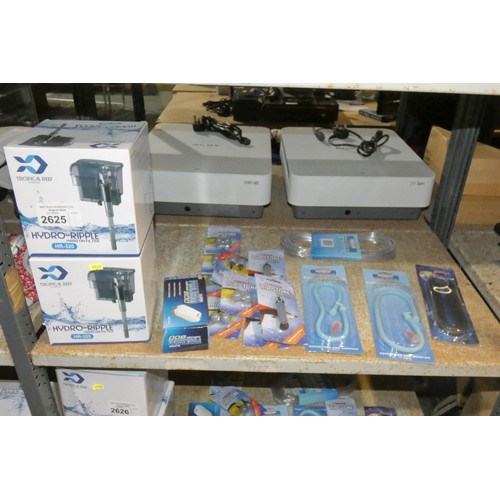 2625 - A quantity of various fish tank accessories including pumps, filter, stones etc. Contents of 1 shelf... 