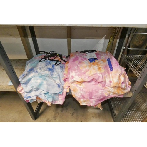 2643 - A quantity of 2 piece pyjamas in pink and orange & blue, mostly large, contents of 1 shelf