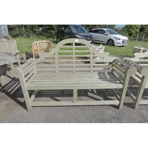 2665 - A large decorative wooden bench