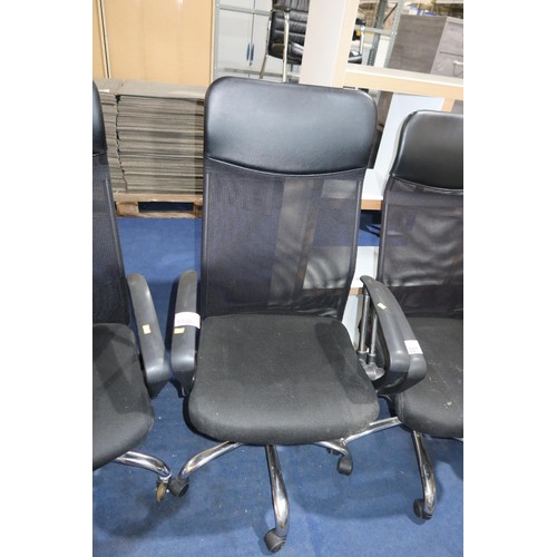 1306 - 1 x black upholstered office swivel chair with mesh back