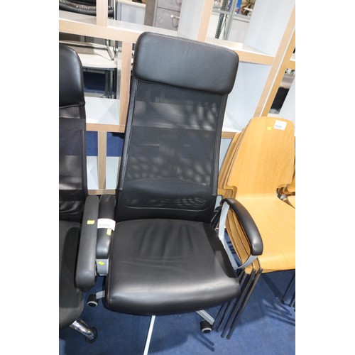 1308 - 1 x black upholstered office swivel chair with mesh back and grey base