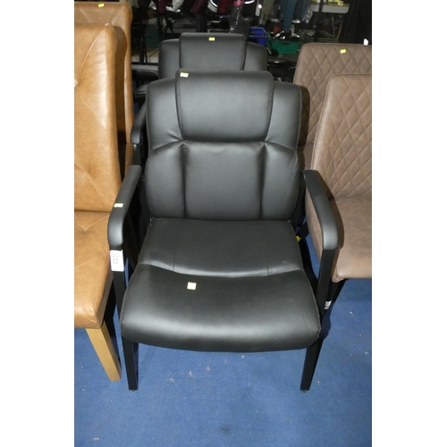 3053 - 2 x black upholstered dining chairs