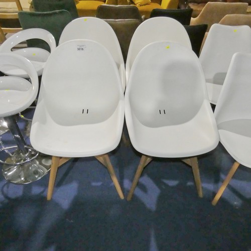 3016 - 4 x white plastic dining chairs with wood legs