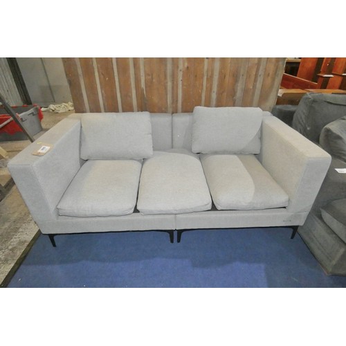 3066 - A light upholstered two part sofa approx 165cm wide. Please note this sofa has three seat cushions a... 