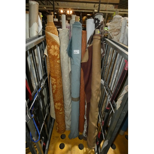 3129 - A quantity of various rolls / part rolls of fabric. Not practical to list in detail so please view o... 