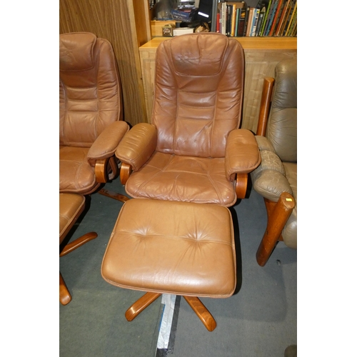 3228 - 1 x brown upholstered reclining swivelling lounge chair with matching foot stool