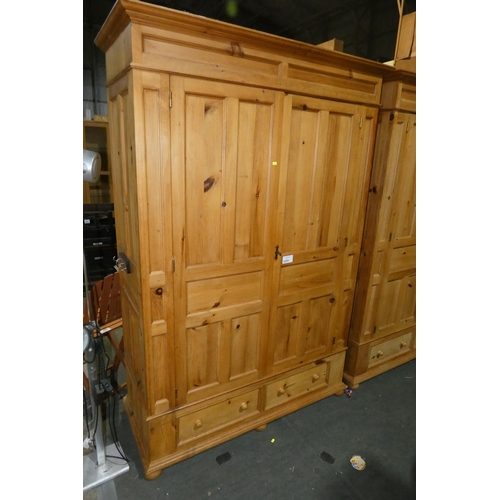 3301 - A Pine double door wardrobe with 2 x drawers below approx 137cm w x 201cm high