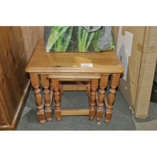 3245 - A nest of three Pine tables