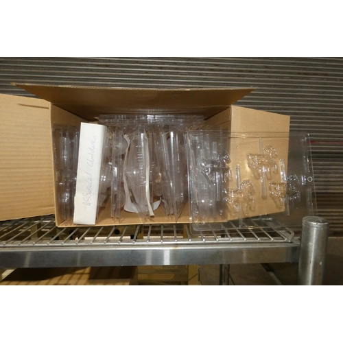 2011 - A box containing a quantity of various PVC easy use chocolate moulds, children related