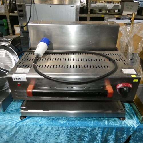 2140 - A commercial stainless steel counter top rise and fall salamander grill, no make or model visible - ... 