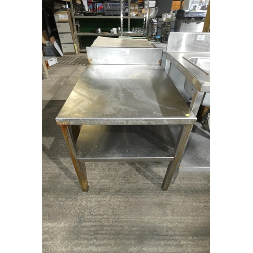 2202 - A commercial stainless steel catering type table with shelf beneath approx 72x94x76cm