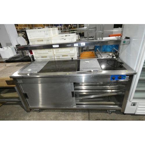 2221 - A mobile commercial stainless steel hot cupboard with gantry and hot plates by Moffat approx 182x72x... 