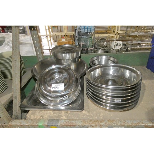 2059 - A quantity of various stainless steel catering related items plate covers, trays etc