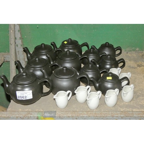 2062 - A quantity of various teapots and mik jugs