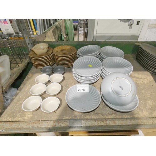 2076 - A quantity of various crockery by Olympia & Porland stoneware