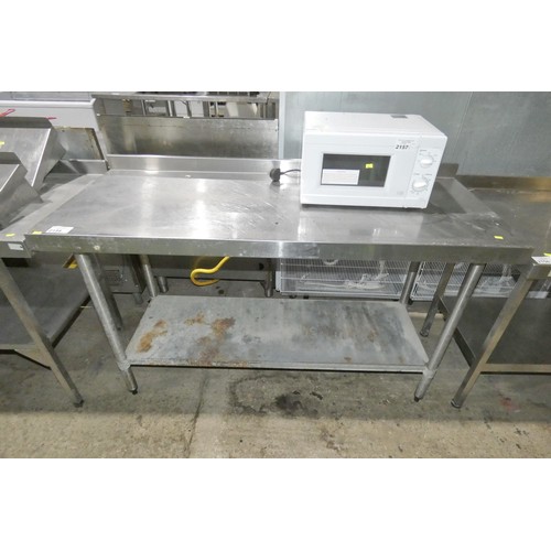 2158 - A commercial stainless steel catering type table with shelf beneath approx 150x60cm