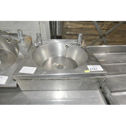 2167 - A stainless steel hand sink with surround