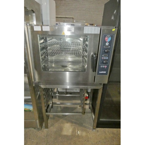 2183 - A commercial stainless steel Combi oven by Lainox type CME061S on a stand with tray rack, 3 phase re... 