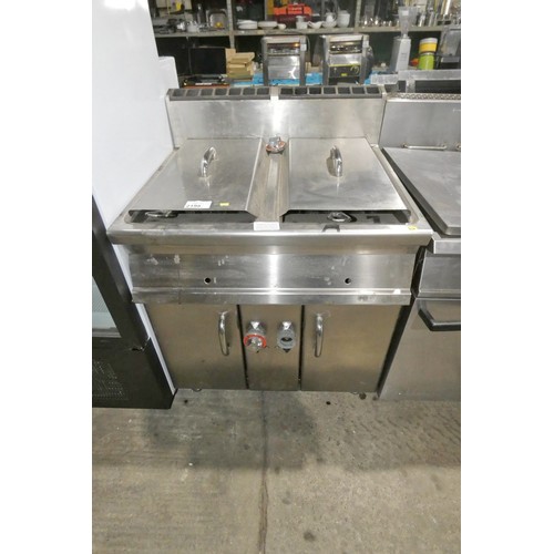 2198 - A commercial stainless steel double basket deep fryer by Lotus, gas - trade