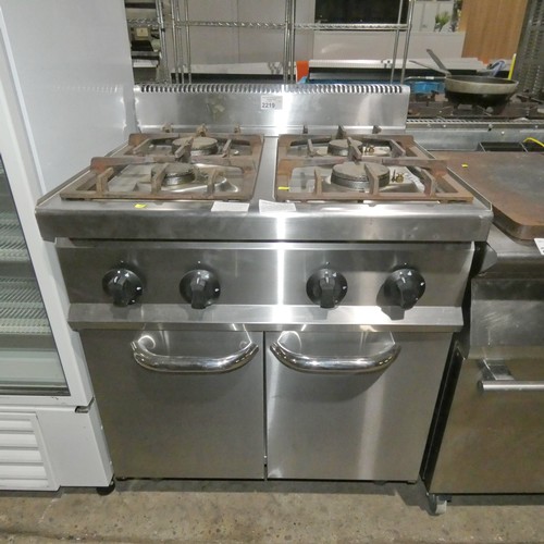 2219 - A gas fired 4 ring hob with storage cupboard beneath type THG7F - trade