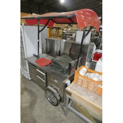 2224 - A commercial stainless steel mobile pull along coffee serving cart, comes with a red canopy, 3 drawe... 