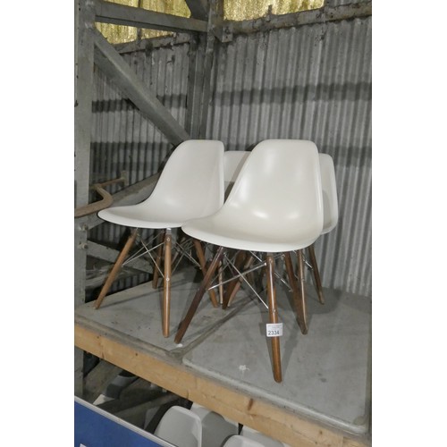 2334 - 4 x white plastic designer style dining / meeting room chairs with metal / wood frames