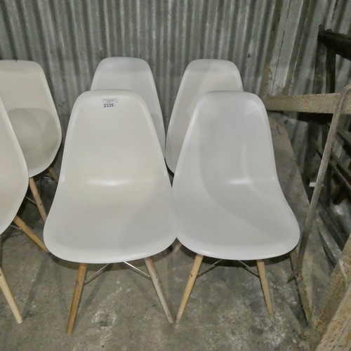 2335 - 4 x white plastic designer style dining / meeting room chairs with metal / wood frames