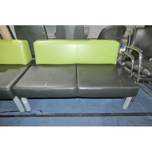 2375 - A two tone upholstered reception type sofa approx 135cm wide - black / green. Please note that the s... 