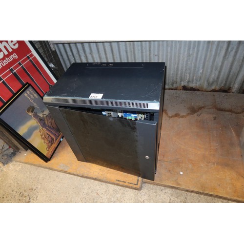 3415 - A metal server cabinet with various network related contents