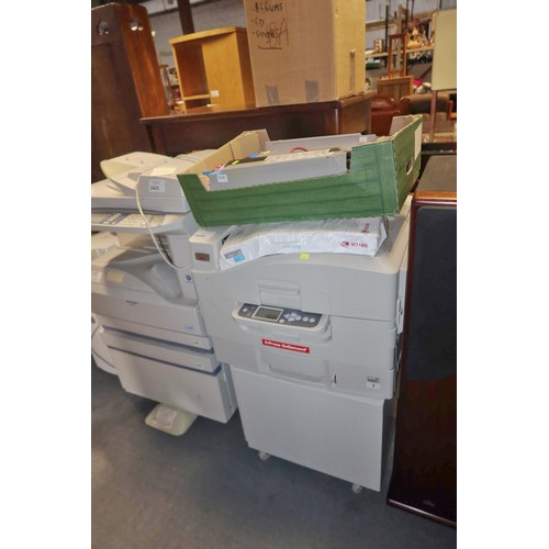 3406 - An office printer by Oki type N31204B, comes with a cabinet and spare, part used cartridges - trade