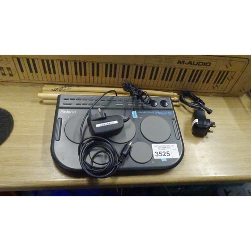 3525 - A portable midi drum pad by Roland type Handypad Pad-5, comes with Midi cable, drum sticks and power... 