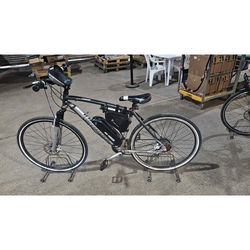 3187 - An electric hybrid road bike by Specialized type Cross trail, has 24 speed, 700c wheels, key and cha... 