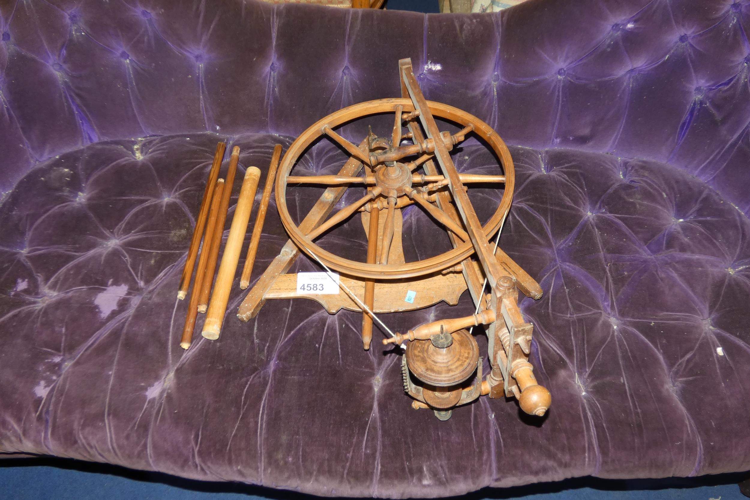 A small farmhouse spinning wheel