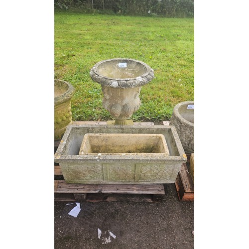 3677 - A large urn and 2 rectanguar concrete planters