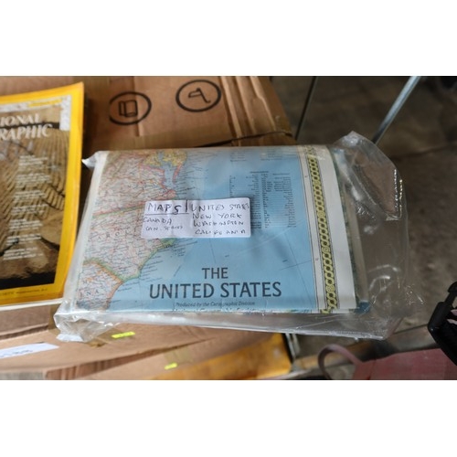 3188 - A large quantity of National Geographic magazines and maps. Contents of 1 wheeled cage which is not ... 