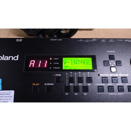 3529 - A guitar effects pedal unit by Roland type V-Guitar synthesizer system VG-8 and a Roland US-20 unit ... 