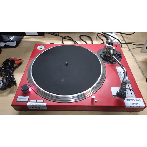 A red variable speed direct drive DJ turntable by Gemini type