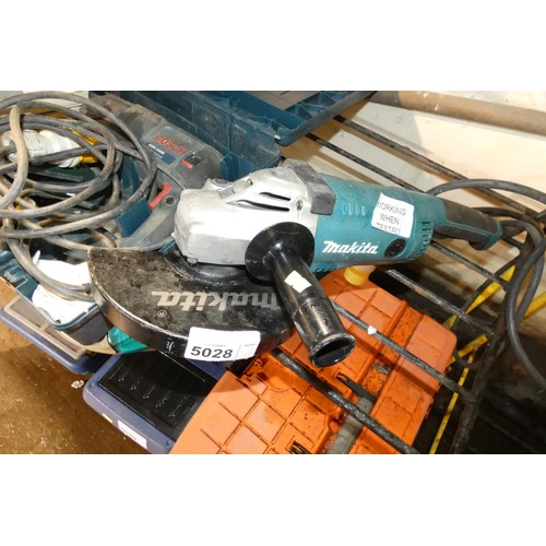 5028 - 1 x Makita GA9020 230mm angle grinder and 1 x Bosch GBH2400 hammer drill - Both 110v. Contents of 1 ... 