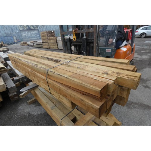 6152 - 19 x wooden posts each measuring approx 10cm x 10cm, lengths vary up to approx 240cm long - Top stac... 