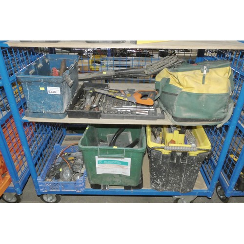 5338 - A quantity of various items including a tool bag, several tool boxes, sockets, hand tools etc. Conte... 