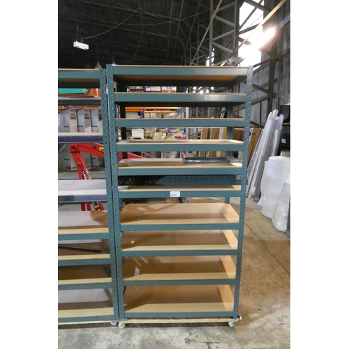 6033 - 1 bay of green metal boltless stores type racking mounted on a four wheeled skate, overall approx 90... 