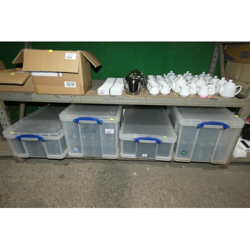 1068 - 4 x plastic really useful boxes containing a quantity of various wine glasses,