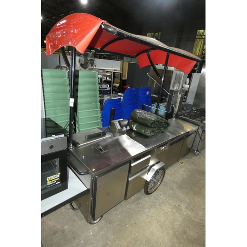 1221 - A commercial stainless steel mobile pull along coffee serving cart, comes with a red canopy, 3 drawe... 