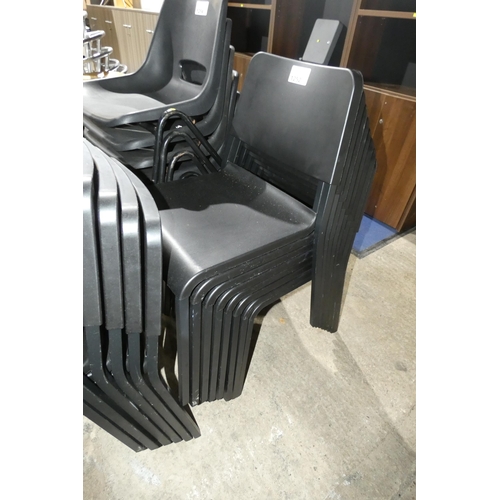 1252 - 8 x black plastic stacking chairs