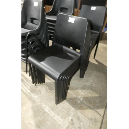 1253 - 6 x black plastic stacking chairs