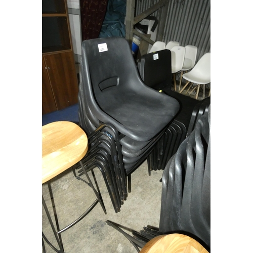 1254 - 7 x metal framed black plastic stacking chairs