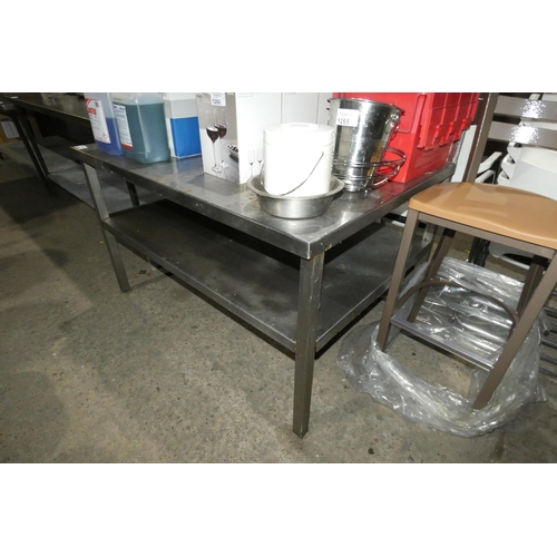 1268 - A commercial stainless steel catering type table with shelf beneath approx 131x94x78cm