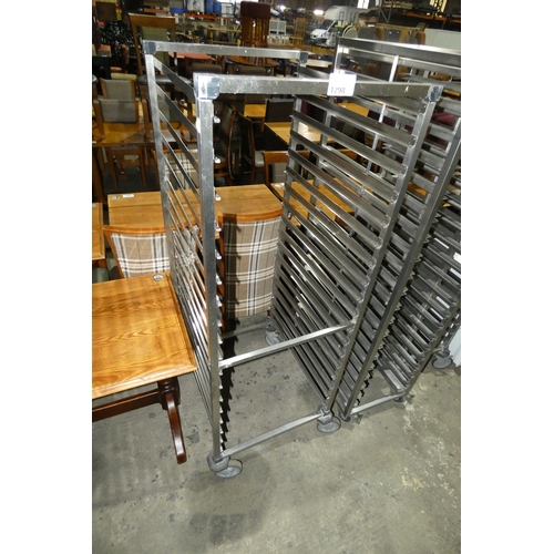 1298 - A commercial stainless steel mobile 18 tray rack, tray dimensions are approx: 530x650mm