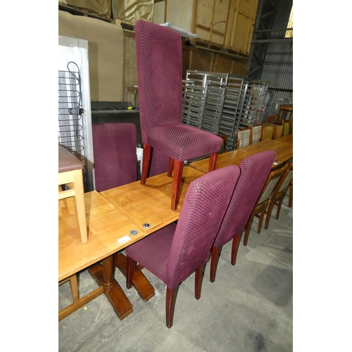 1302 - A wooden restaurant/pub type table with 5 matching purple upholstered dining chairs