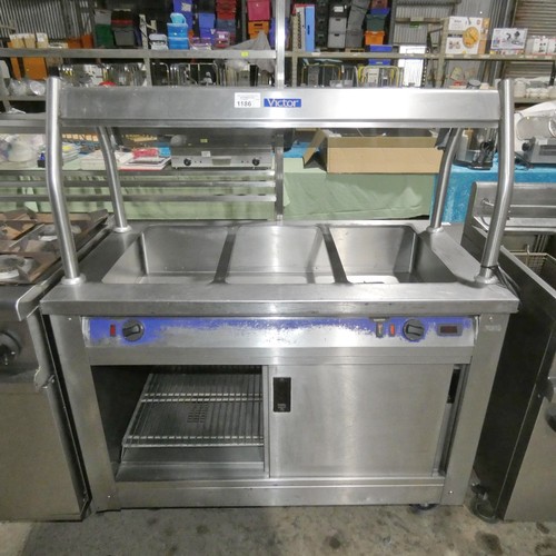 1186 - A mobile commercial stainless steel carvery type unit with heated cabinet and gantry by Victor type ... 